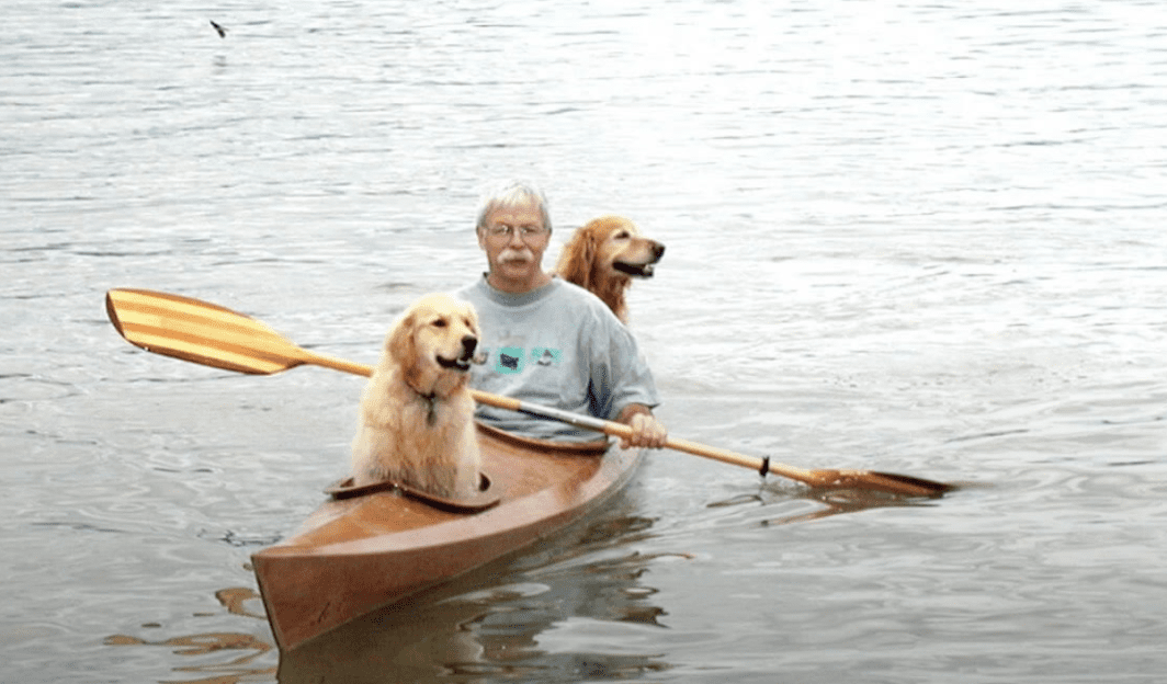 Man Builds a Custom Kayak his two dogs